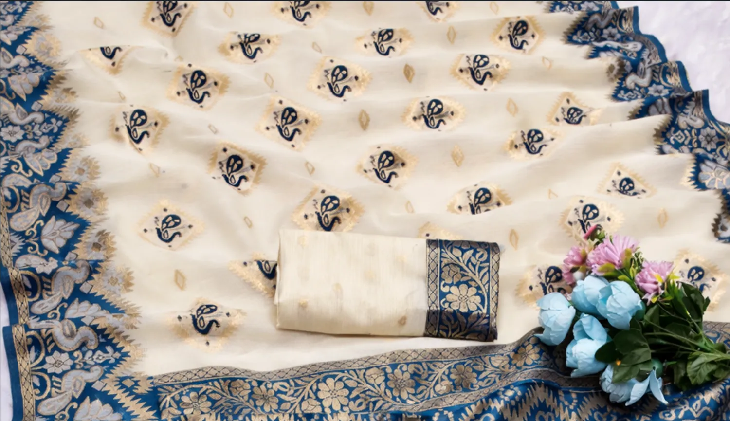Ivory White & Sapphire Cotton Silk Saree with Beautiful Contrast Peacock Border and tassels